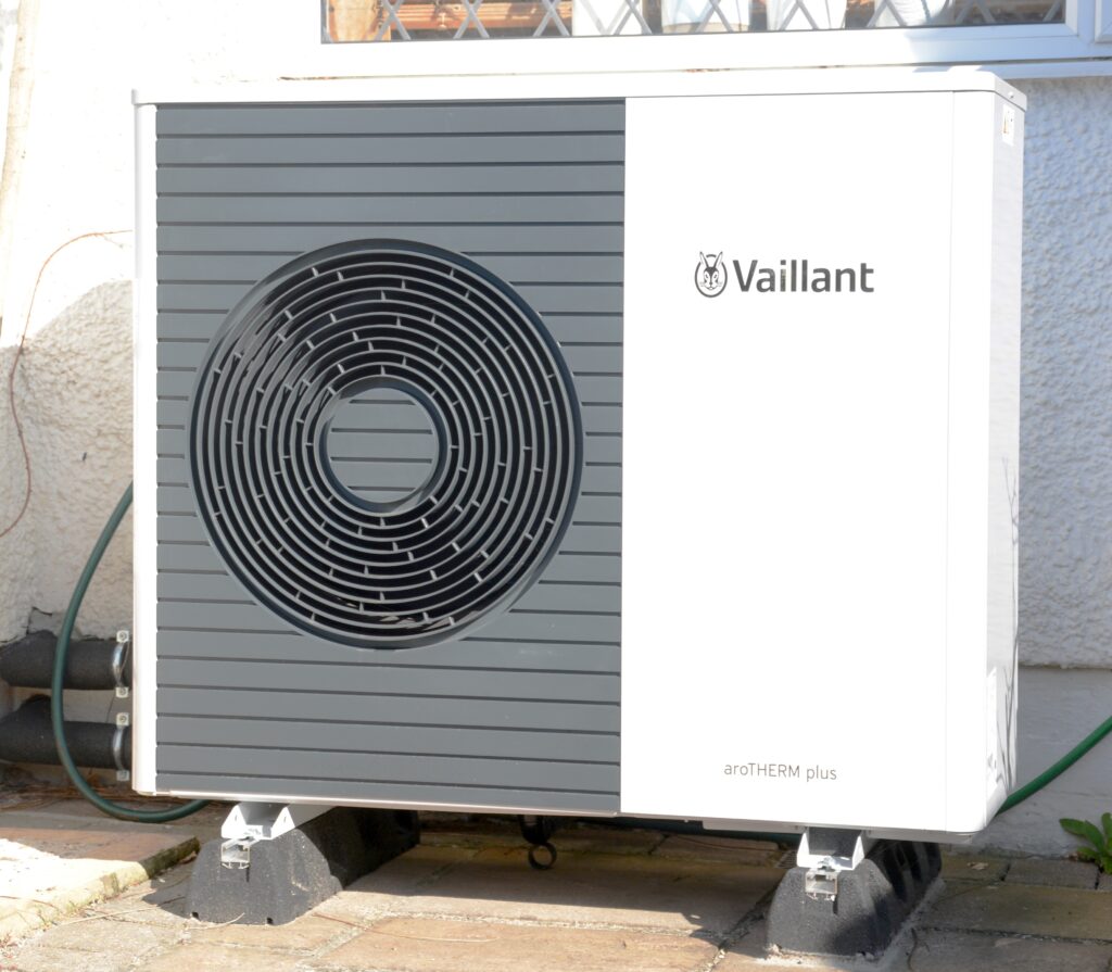 Vaillant aroTHERM Plus air-source heat pump installed outside a UK suburban home