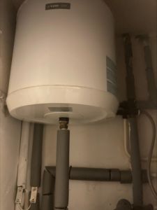 Hot water expansion tank above main tank